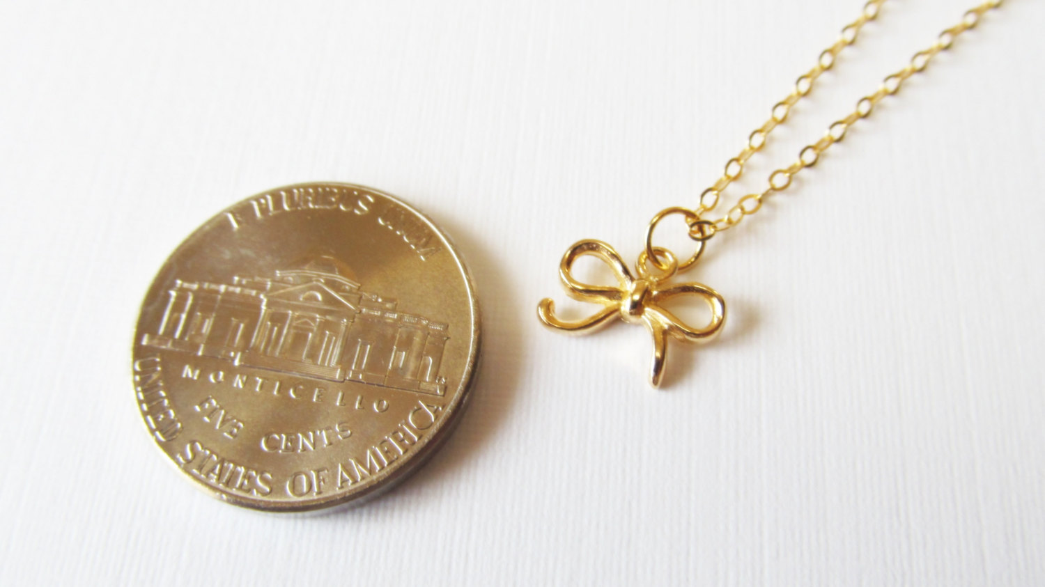Nuclear Bow Necklace Gold